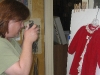 Kim Hanson photographing an artifact