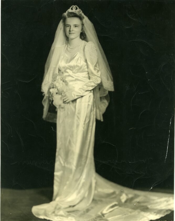 Harma (Peterson) McKenzie on her wedding day in 1945. Her daughter, Karen (McKenzie) McAdoo, would wear this dress at her own wedding in 19